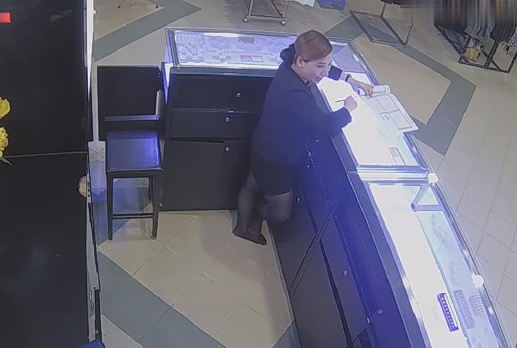 The jewelry store hostess in black nylon show us her cute feet! 20