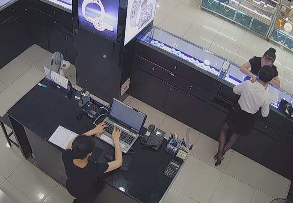 The jewelry store hostess in black nylon show us her cute feet! 78