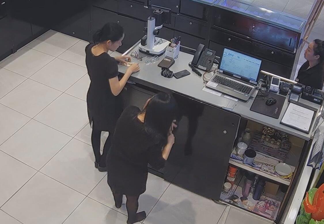 The jewelry store hostess in black nylon show us her cute feet! 108