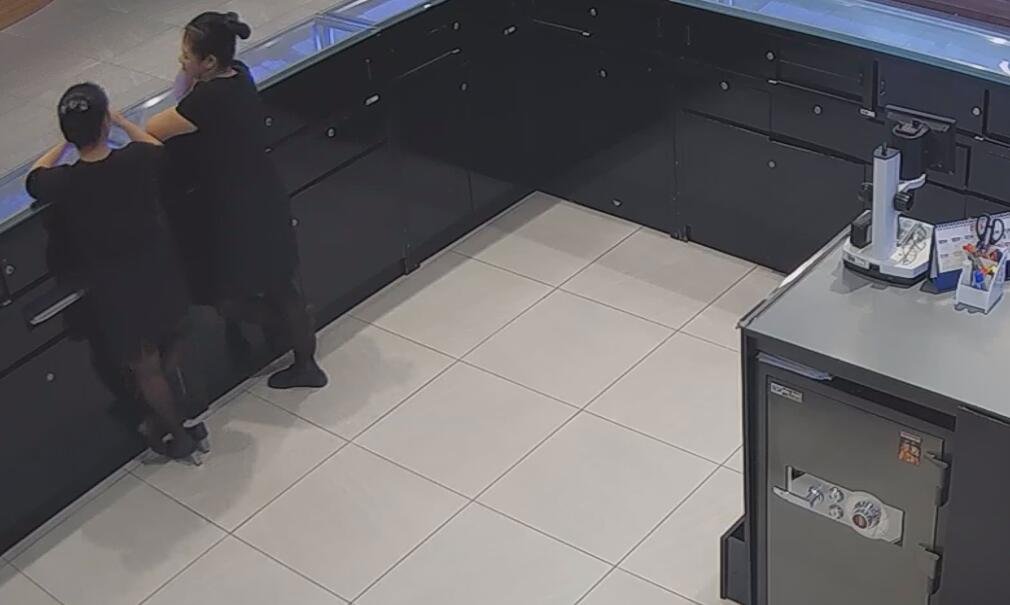 The jewelry store hostess in black nylon show us her cute feet! 113