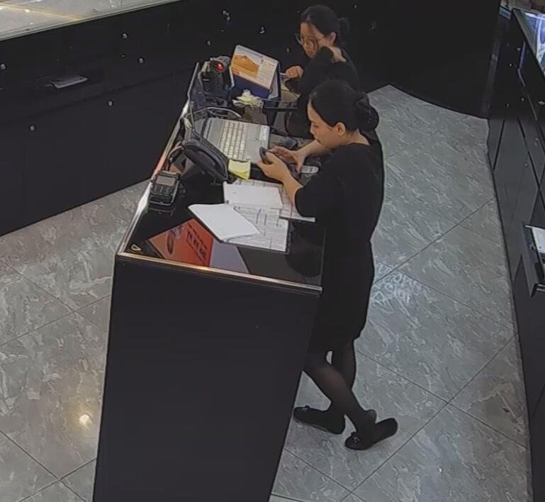 The jewelry store hostess in black nylon show us her cute feet! 141