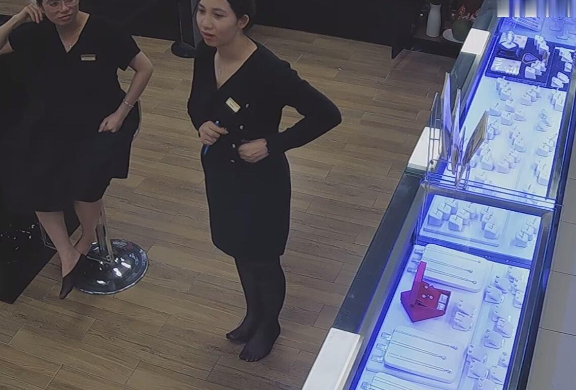 The jewelry store hostess in black nylon show us her cute feet! 148