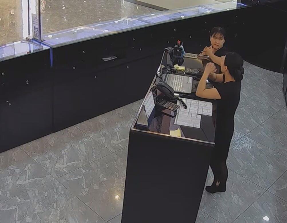 The jewelry store hostess in black nylon show us her cute feet! 163