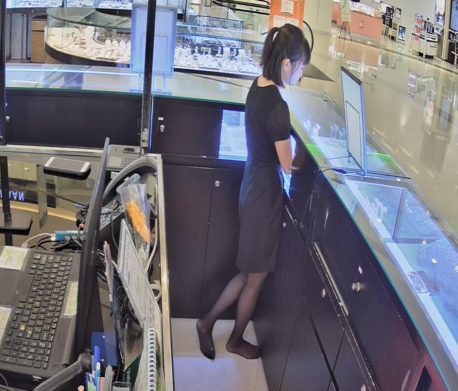 The jewelry store hostess in black nylon show us her cute feet! 164