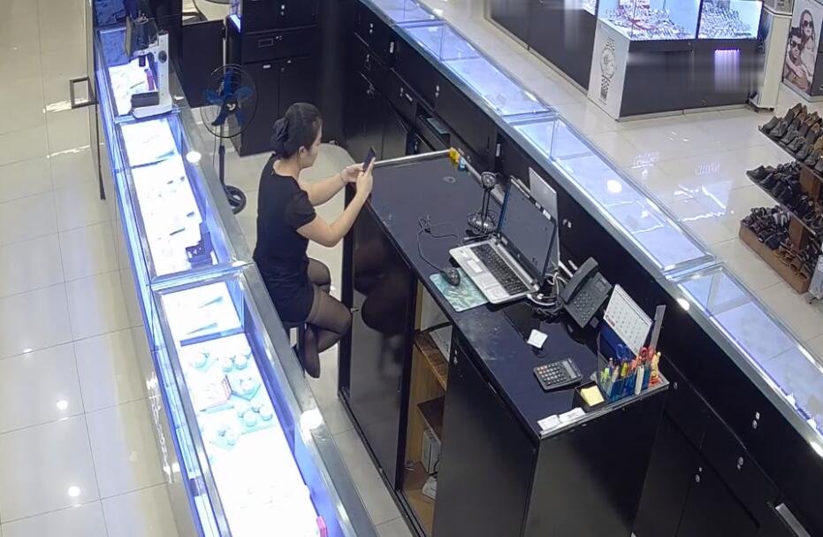 The jewelry store hostess in black nylon show us her cute feet! 170