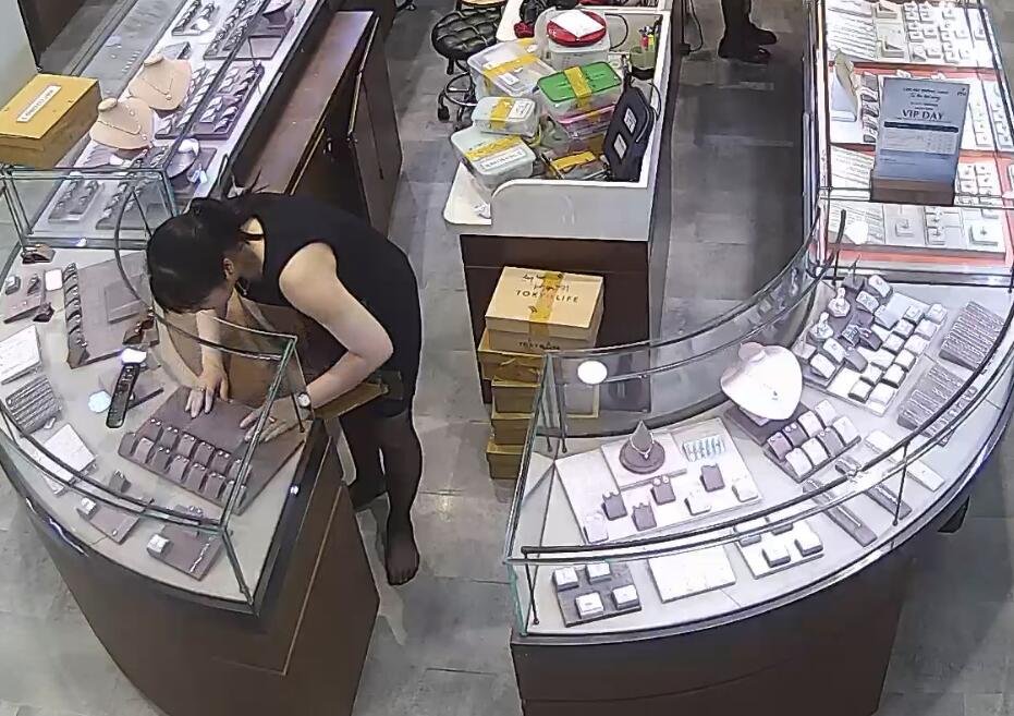 The jewelry store hostess looks like very busy in the morning