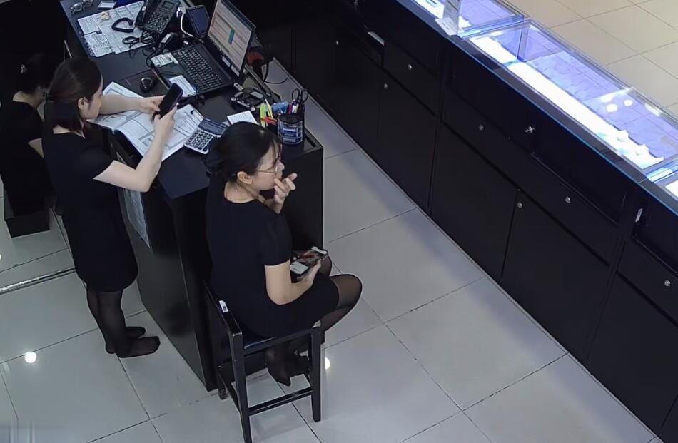 The jewelry store hostess in black nylon show us her cute feet! 184