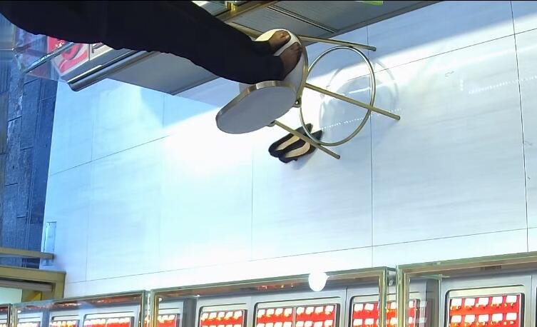 The jewelry store hostess in black nylon  remove heels show us her cute feet