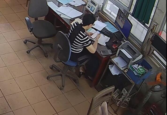 The office lady in blue uniform remove heels and take a nap