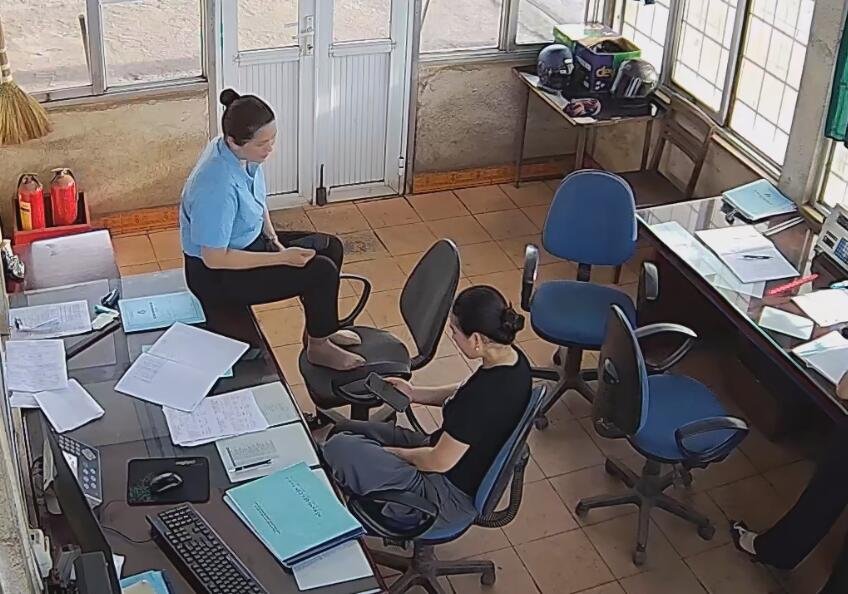 The office lady in blue uniform show us her cute nylon feet 2