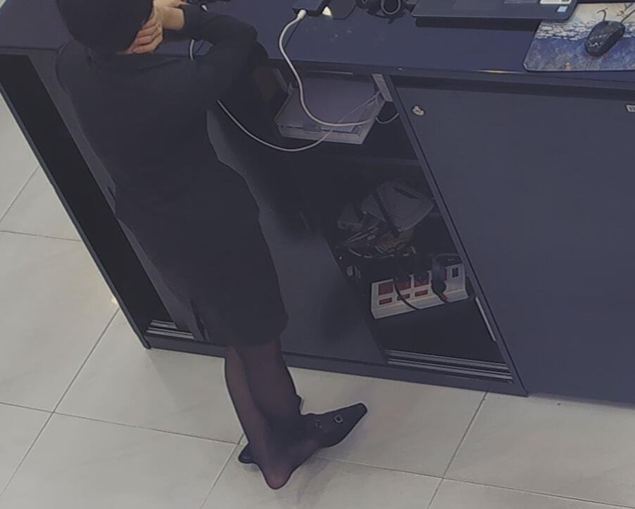 The jewelry store hostess in black nylon show us her cute feet! 202