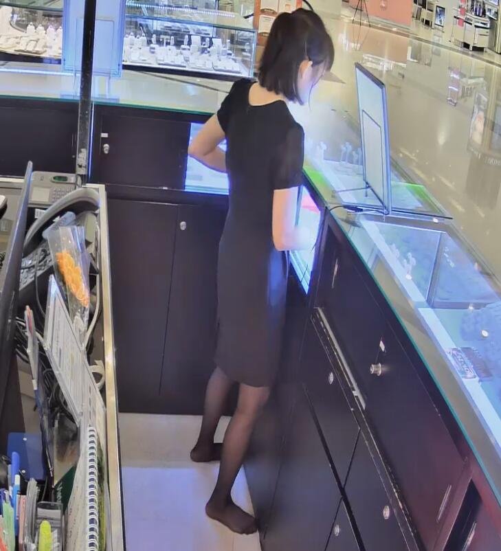 The jewelry store hostess in black nylon show us her cute feet! 213