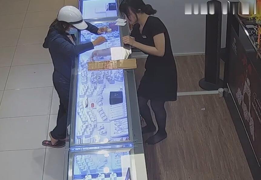 The jewelry store hostess in black nylon show us her cute feet! 241